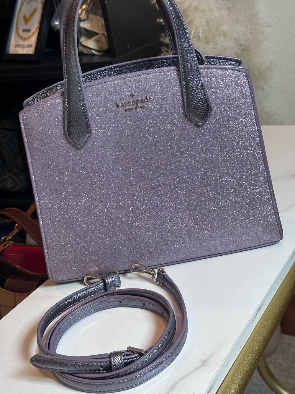Kate Spade Purple Glitter Satchel
Crossbody Bag